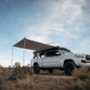 Solar Eclipse Pro - Retractable Hard Case Awning on Toyota Tacoma - Traverse Adventure Gear